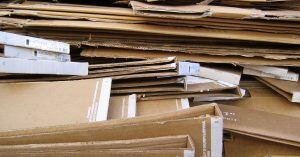 A pile of flattened cardboard boxes.