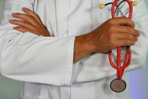 person holding a stethoscope